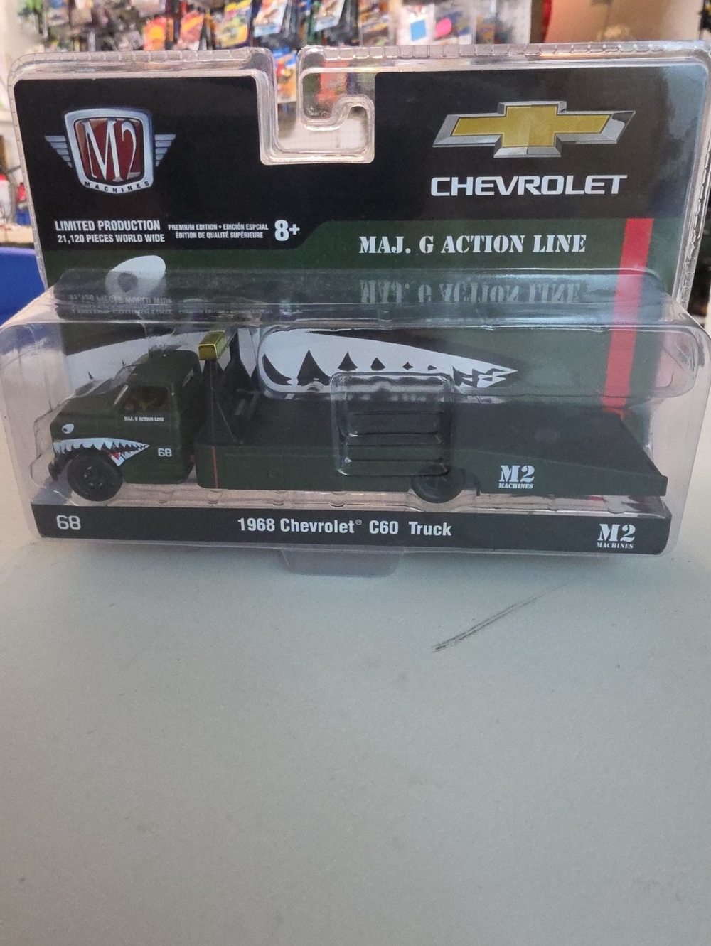 Machine Green 1968 Chevrolet C60 Flatbed Truck Toy with Shark-Mouth Detail